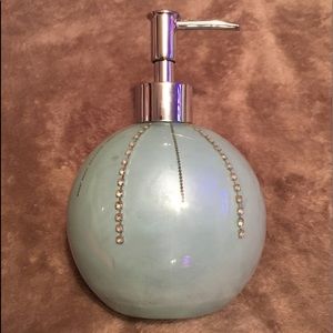 Soap or lotion dispenser. Blue with rhinestone detail.